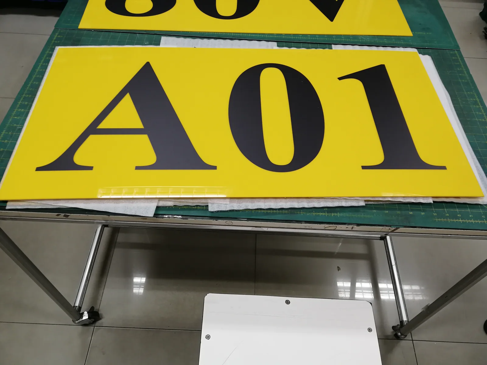 ป้ายรหัสตำแหน่งคลังสินค้า (Rack Location Label) — อลูมิเนียม · พิมพ์ UV